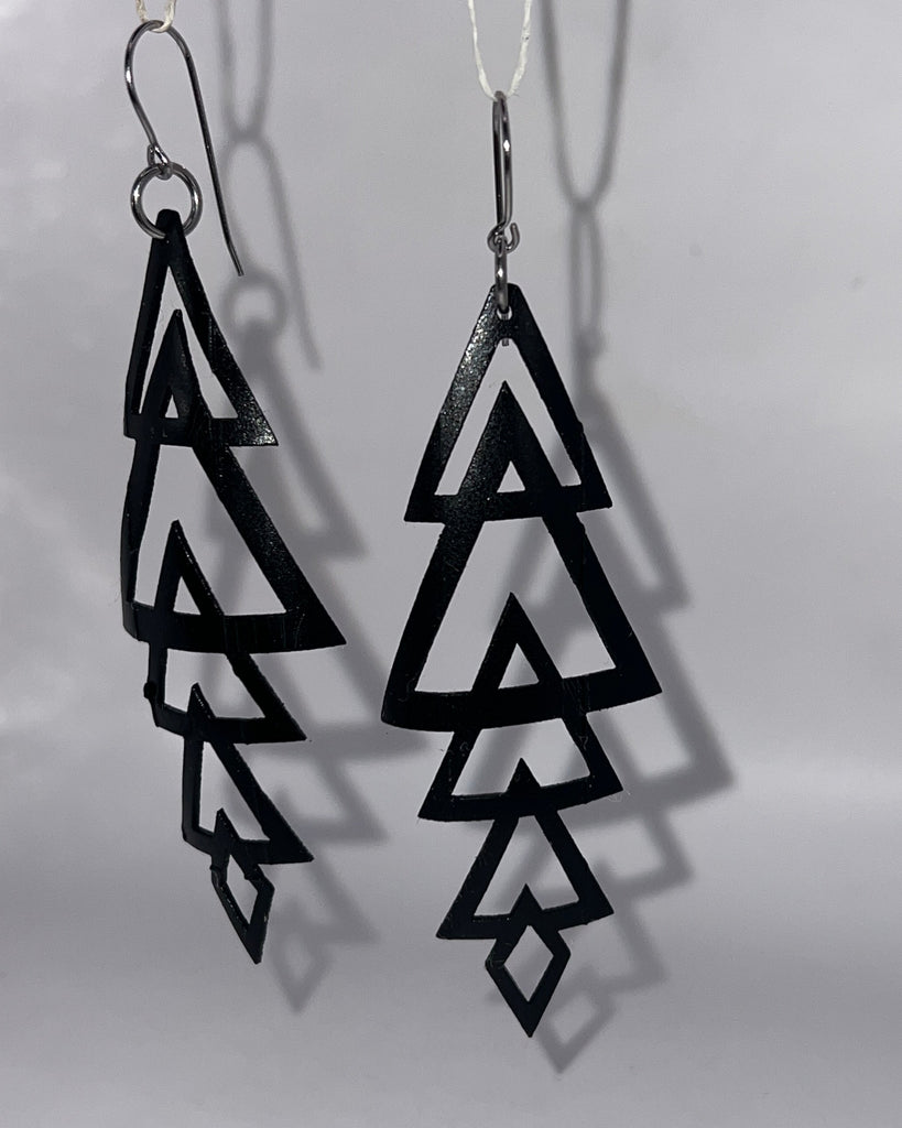 upcycled, laser cut, bike tube rubber earring, weightless, waterproof, comfortable, stainless steel non-allergenic ear wires and findings.