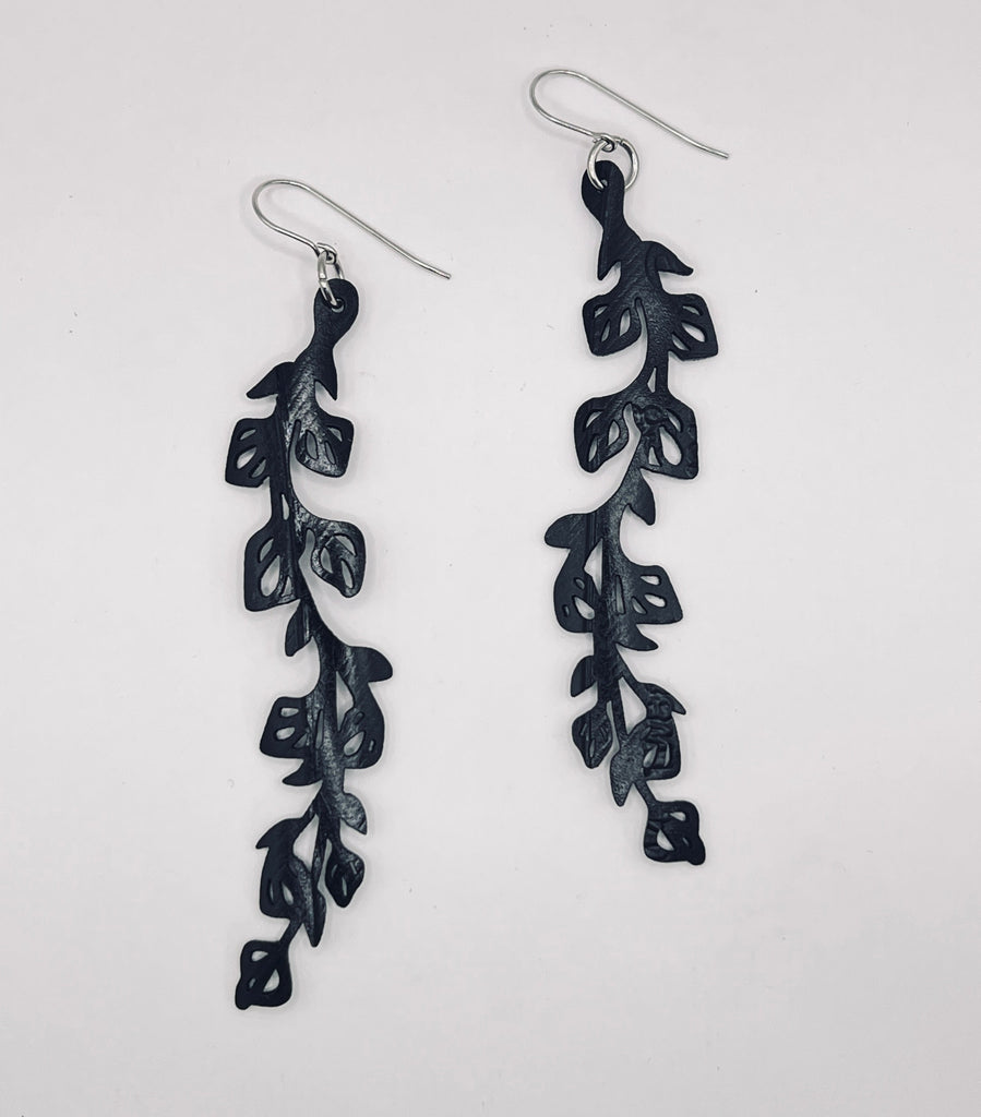 upcycled, laser cut, bike tube rubber earring, weightless, waterproof, comfortable, stainless steel non-allergenic ear wires and findings.