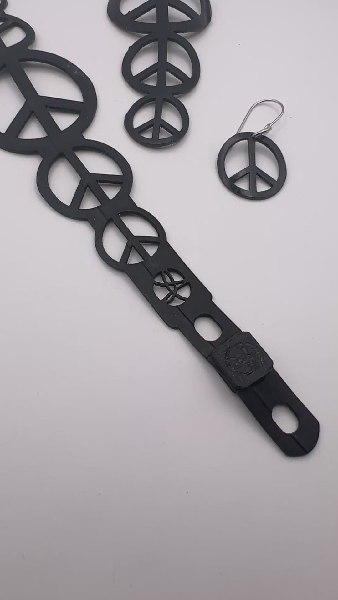 Spread Peace, Give Love is a upcycled bike inner tube, laser cut jewelry collection with stainless steel findings.