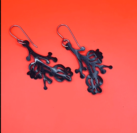 upcycled, laser cut, bike tube rubber earring, weightless, waterproof, comfortable, stainless steel non-allergenic ear wires and findings.