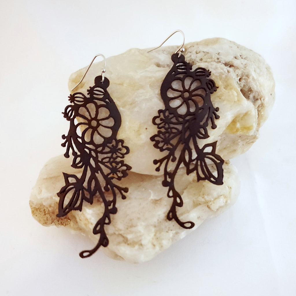 Woodland flower bouquet adventure rubber earring. Made from upcycled bicycle inner tubes.
